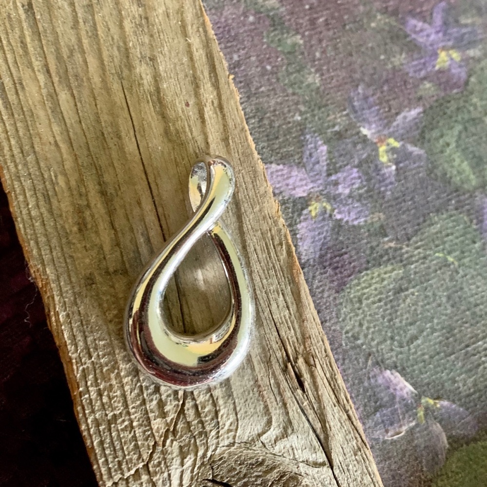 Silver tone Swoop Pendant